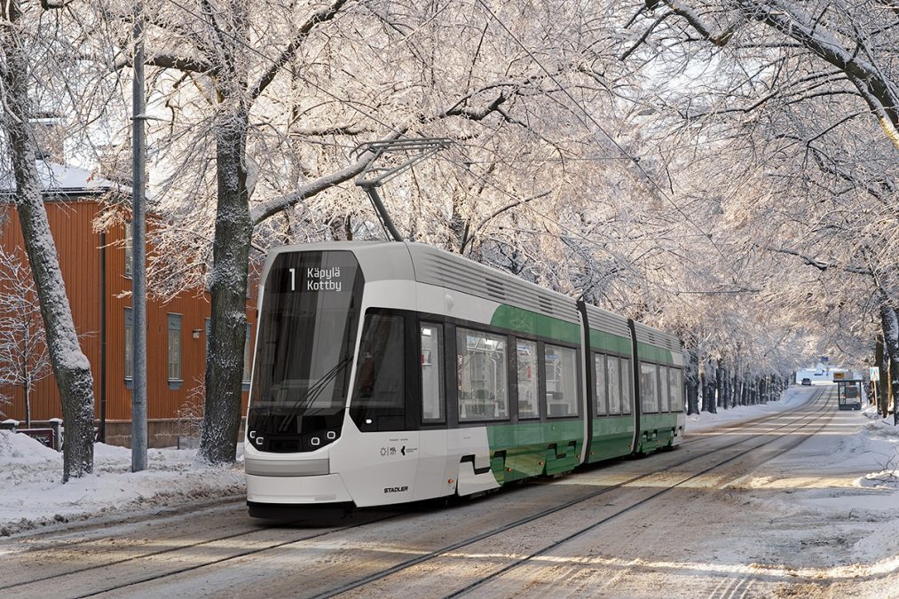 Havainnekuvassa Stadlerin raitiovaunu talvimaisemassa.
