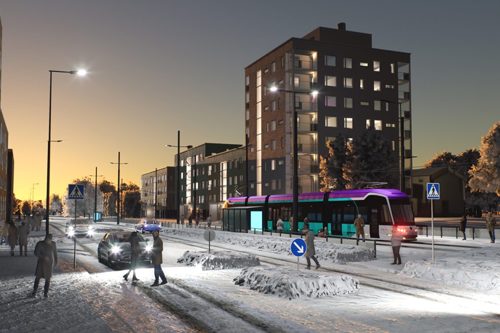 Havainnekuva raitiovaunusta lumisella ja hämärällä kadulla Koivuhaassa.
