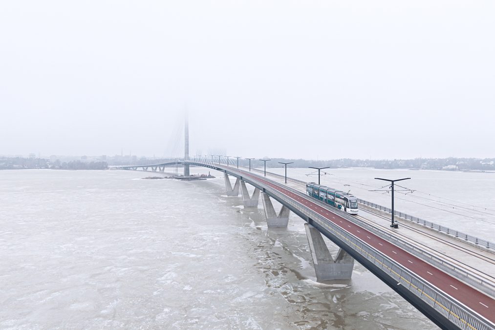 Tram on the foggy Kruunuvuori Bridge.
